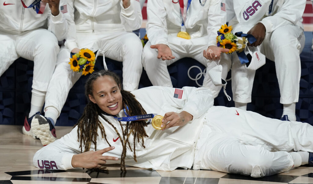 United States's Brittney Griner (15) poses with her gold medal during the medal ceremony for women's basketball at the 2020 Summer Olympics, Sunday, Aug. 8, 2021, in Saitama, Japan. 