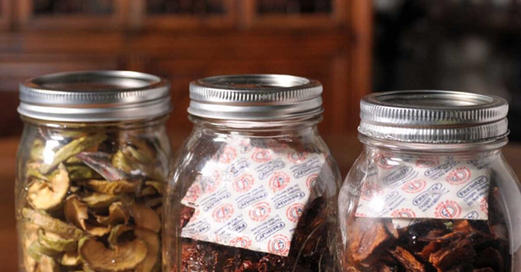 Place a silica gel packet in your salt or sugar container