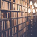 Stack of open books representing celebrity book lovers and famous readers