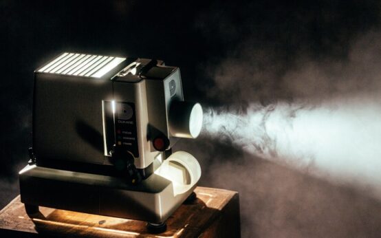 Cinema film reel and popcorn representing controversial and boundary-pushing movies