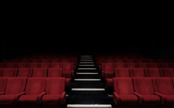 A grand cinema theater representing the world's wealthiest Hollywood actors