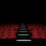 Empty cinema with red seats — the ultimate true crime documentary guide